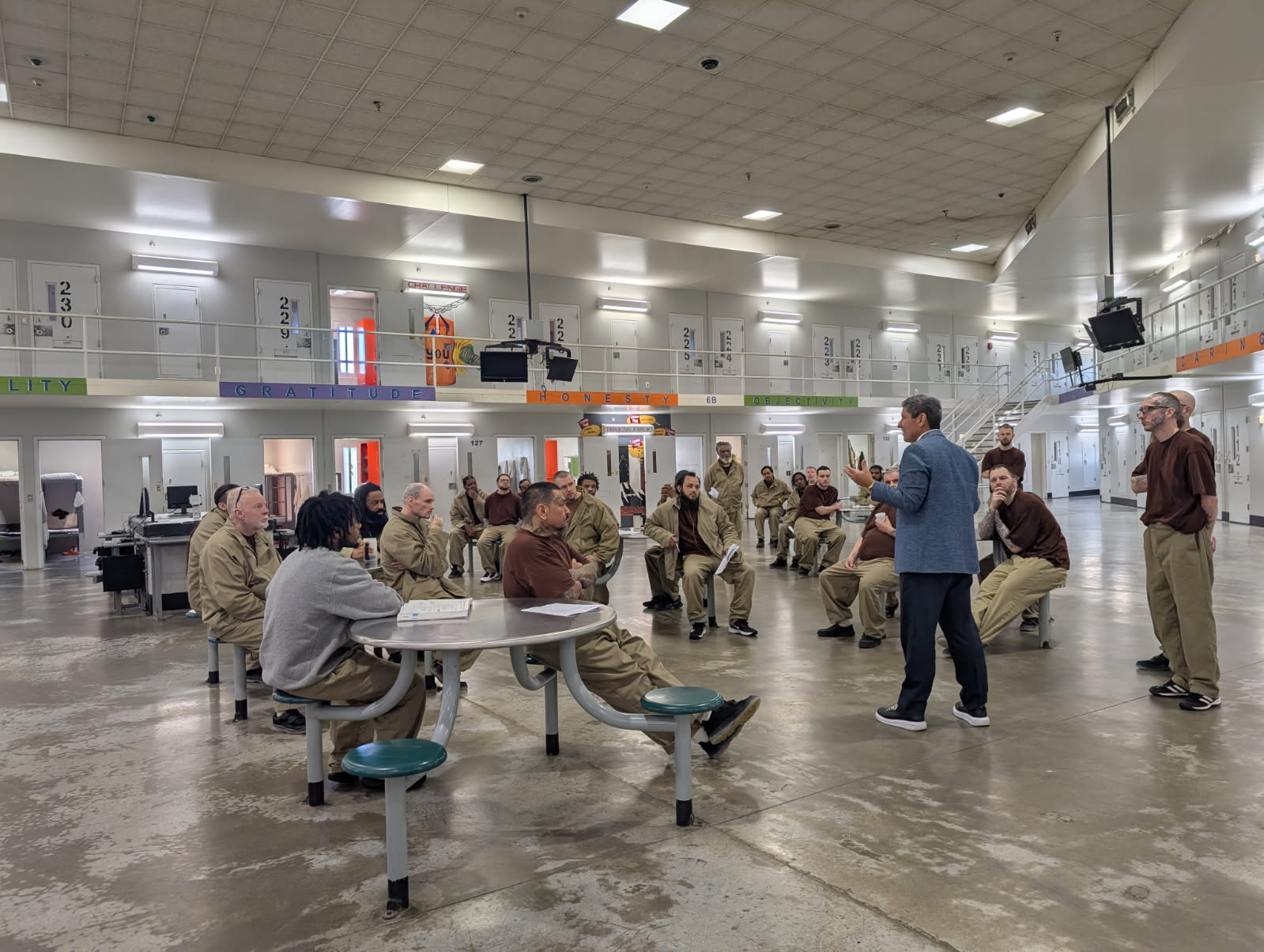 Michael Santos teaching a group of incarcerated people in a federal prison housing unit